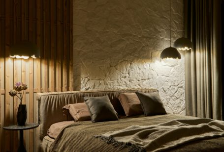 a-bedroom-with-a-bed-and-two-lamps