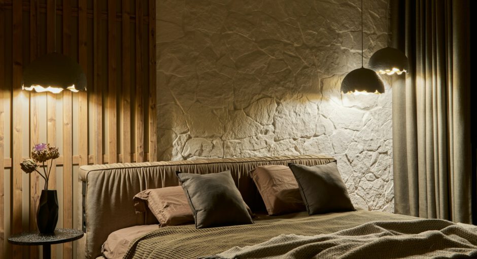 a-bedroom-with-a-bed-and-two-lamps