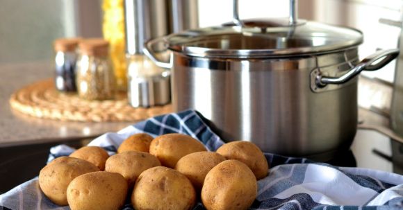 Cookware - Potatoes Beside Stainless Steel Cooking Pot