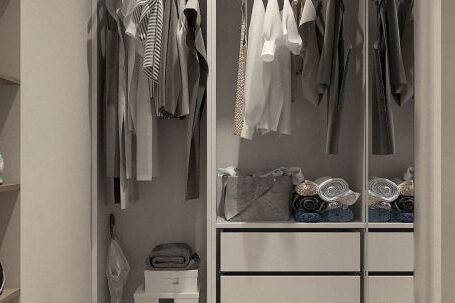 Wardrobe - Assorted Clothes Hanged Inside Cabinet